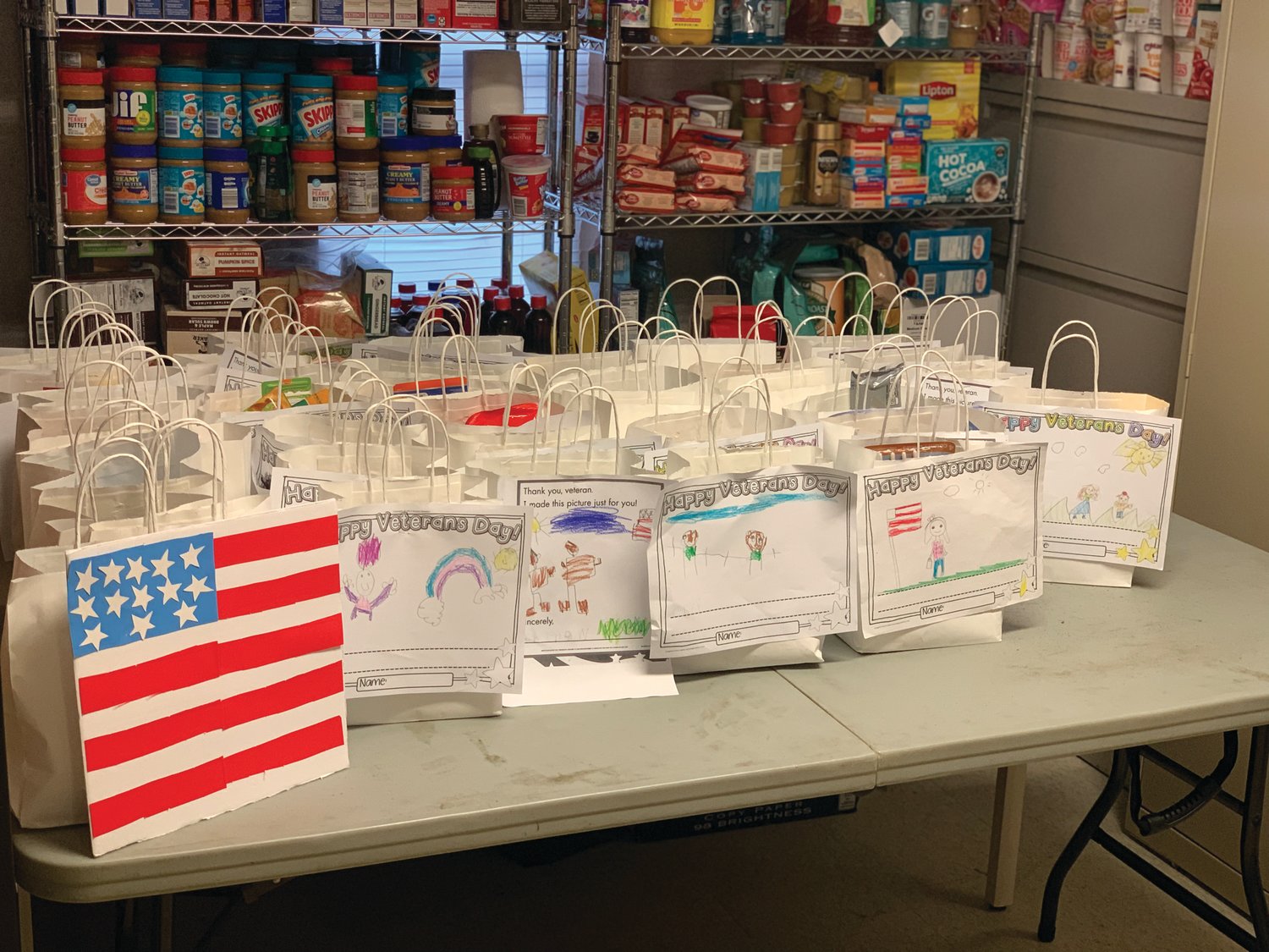 BAGS TO RICHES: The teachers dropped off 46 bags with Operation Stand Down Rhode Island in Johnston. The agency will distribute the bags to local veterans.